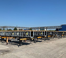 Pre-assembled beam forms ready to be cycled for multiple pours.