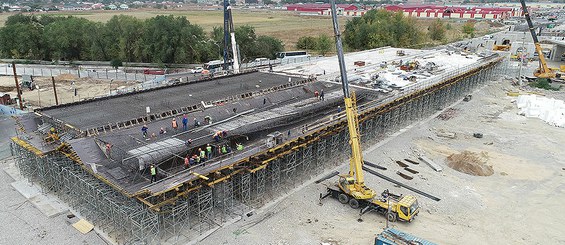 Construction of the road junction at the intersection of Ryskulov and Kuldzhinskiy streets, Almaty, Kazakhstan