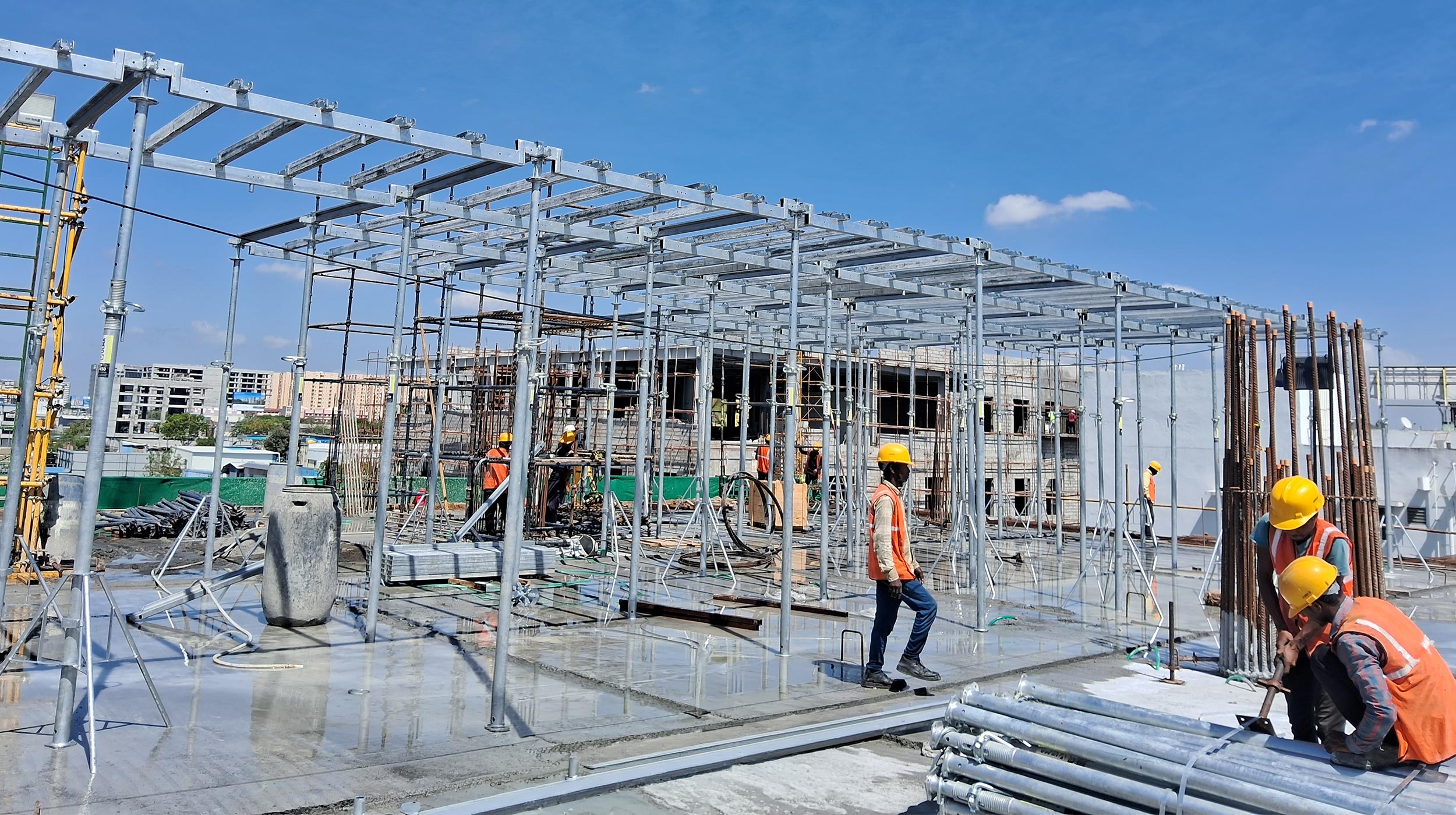 Advanced ONADEK modular formwork system for slab construction solution for Brigade Tech Boulevard commercial building.